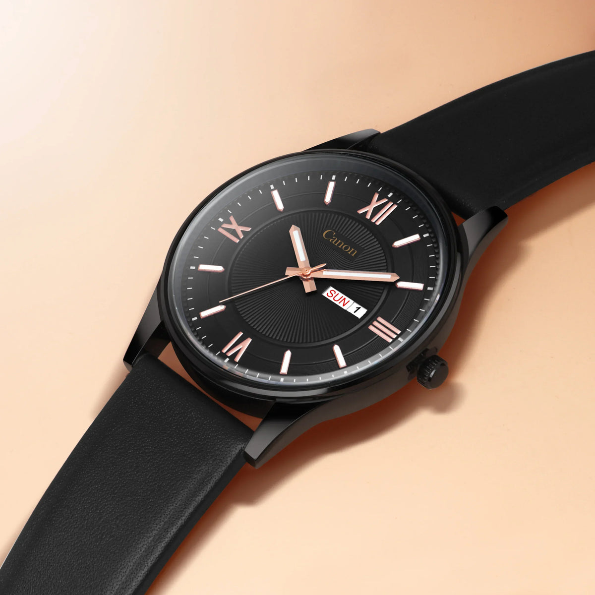 Analog black wristwatch with rose gold Roman numerals, black leather strap, date display