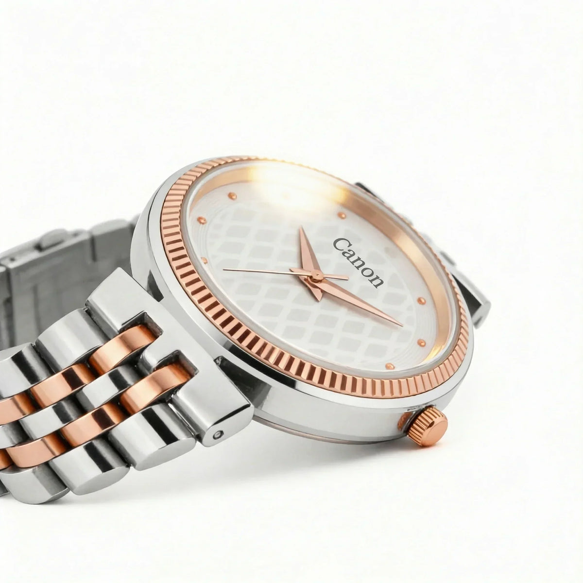 Analog wristwatch with silver and rose gold bracelet, textured white dial, and rose gold accents