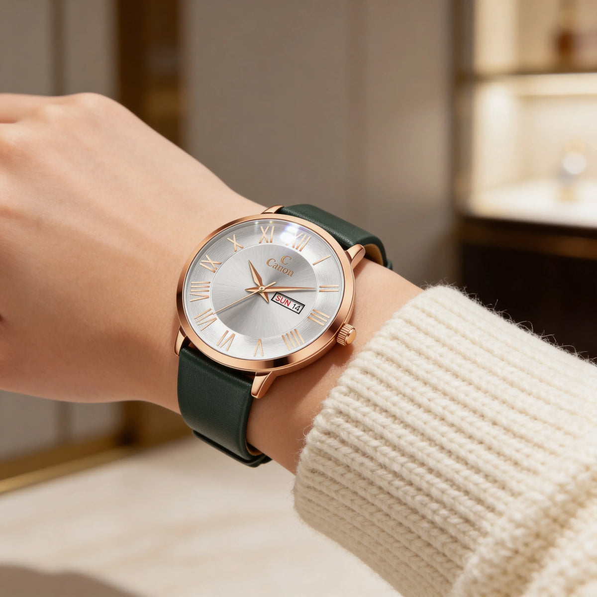 Elegant analog wristwatch with gold case, silver dial, Roman numerals, and green leather strap