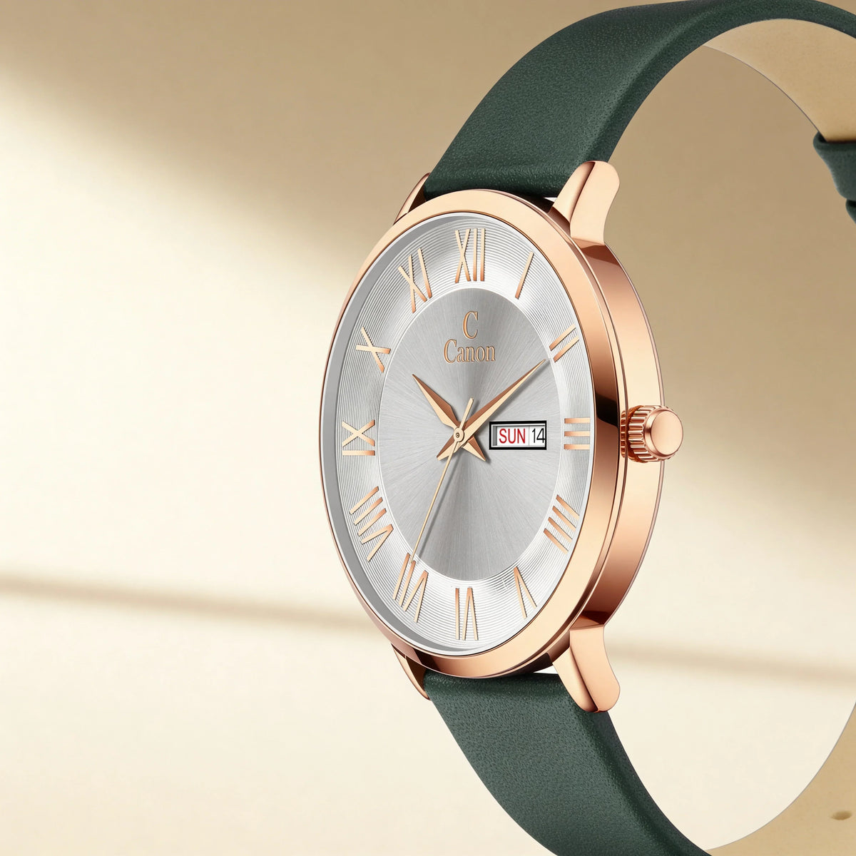 Rose gold analog watch with silver dial, Roman numerals, green leather strap, date display
