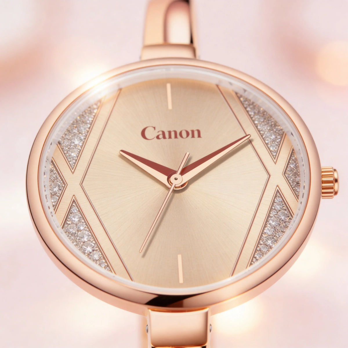 Elegant rose gold analog watch with crystal accents and minimalist dial on a soft background