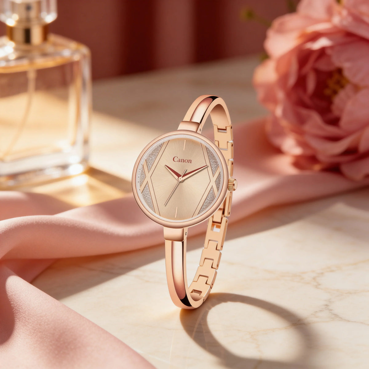 Elegant rose gold women's analog watch with minimalist dial, pink floral and satin accents.