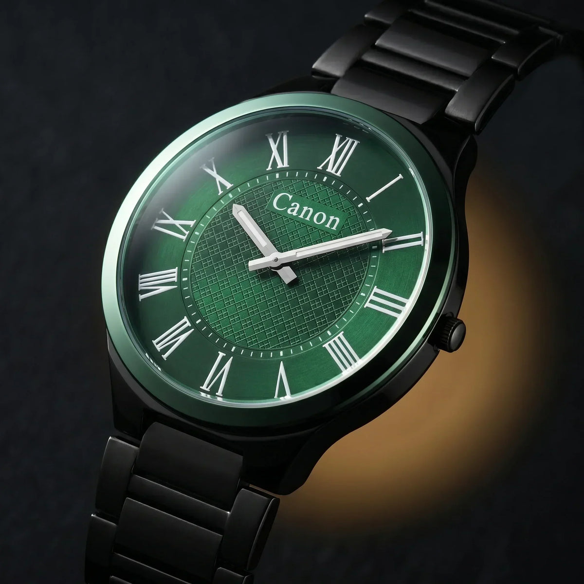 Canon analog watch with green dial, Roman numerals, and black metal band