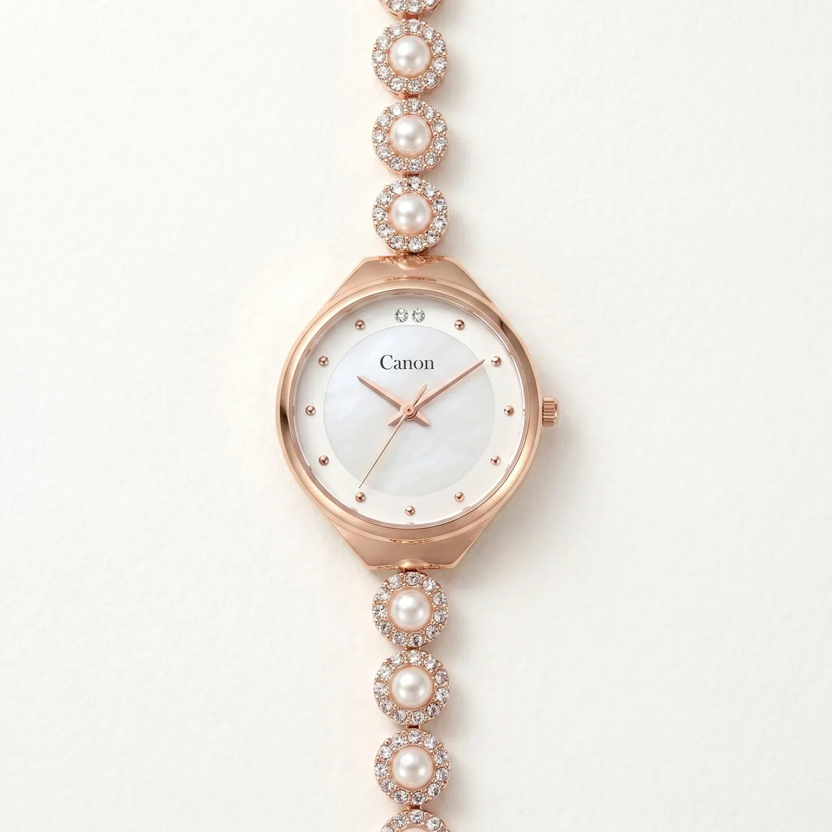 Elegant rose gold analog watch with pearl and crystal accents, mother-of-pearl dial, for women