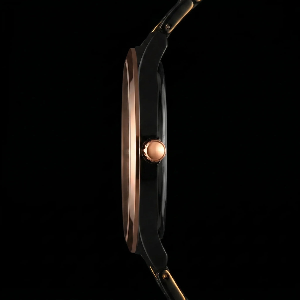 Slim black and rose gold analog watch side view, showcasing sleek design and crown detail