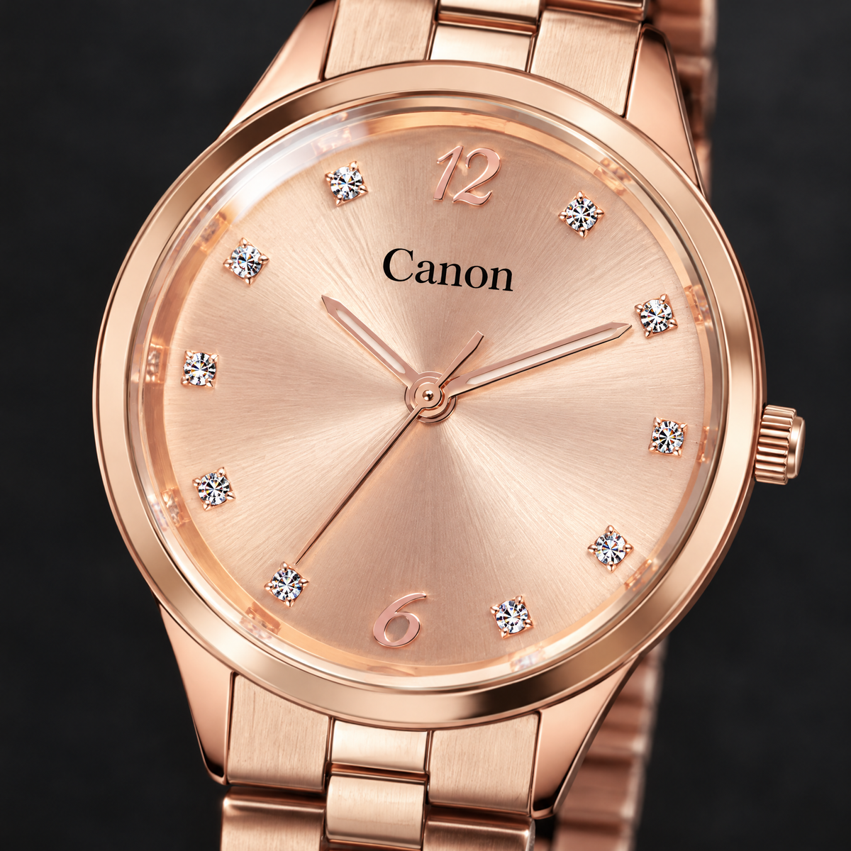 Macro close-up of CN-531 rose gold sunburst dial with crystal markers