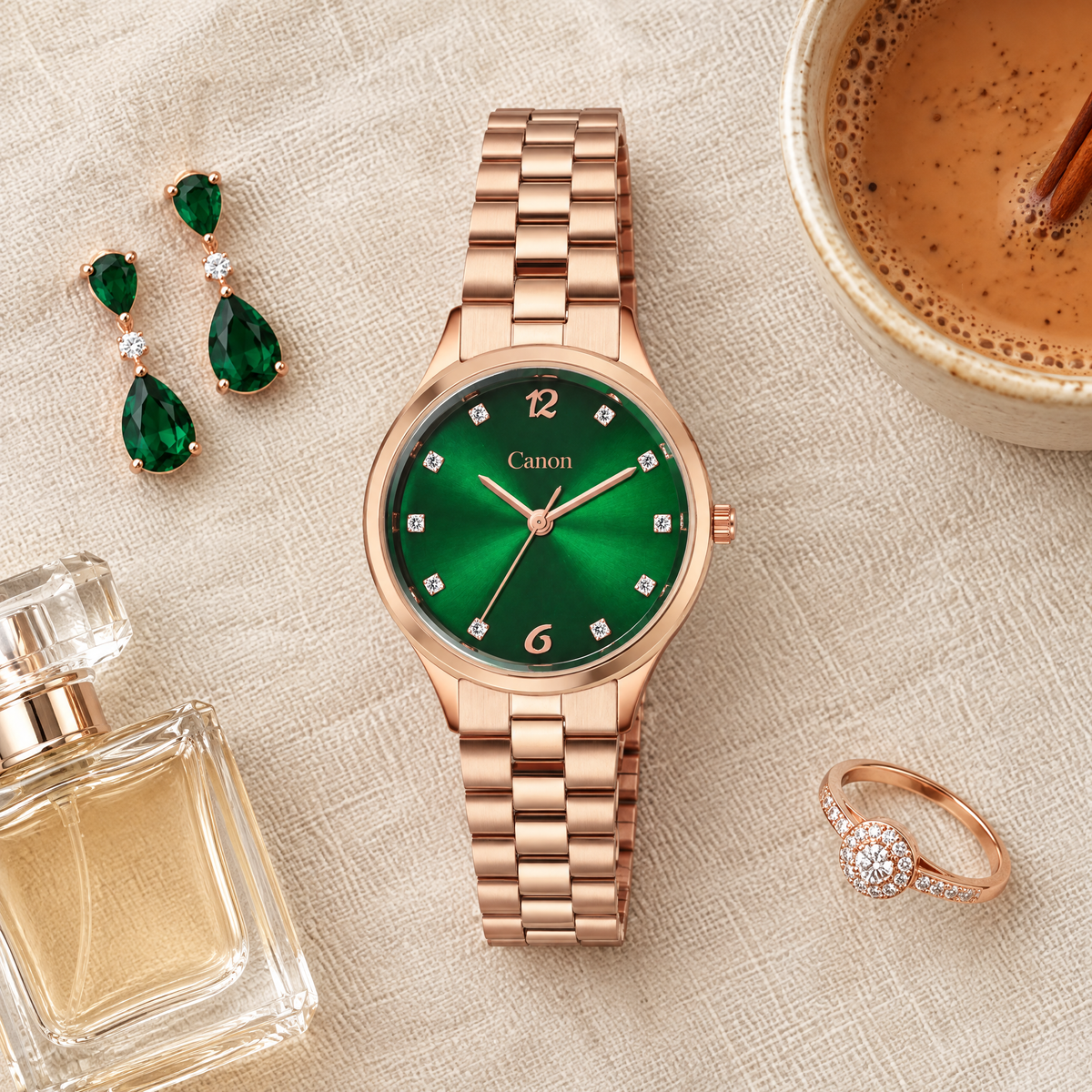 CN-528 flat-lay with emerald earrings, perfume and chai