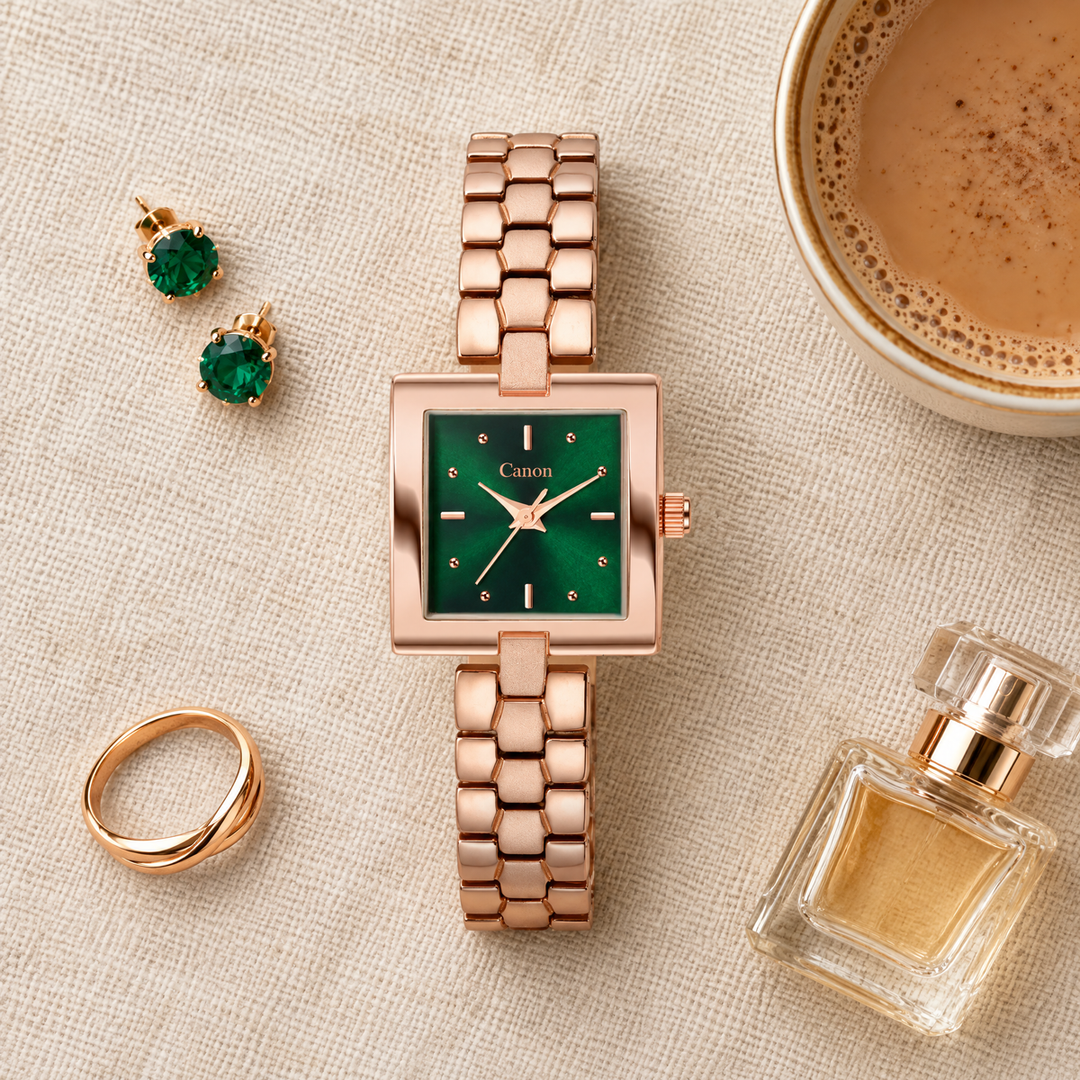 CN-537 flat-lay with emerald earrings, perfume and chai