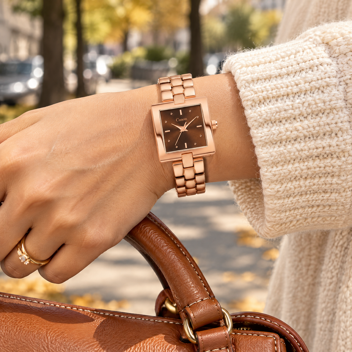 Woman wearing CN-538 holding a cognac handbag