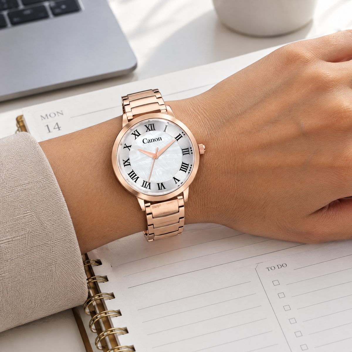 Woman wearing CN-541 at an office desk with planner
