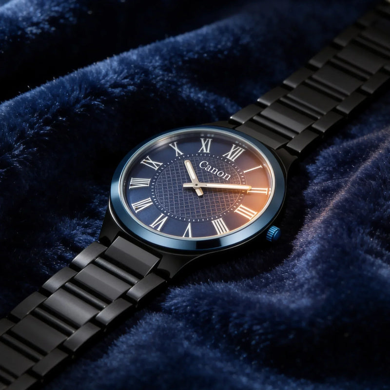 Canon analog watch with Roman numerals, black metal band, on blue velvet background