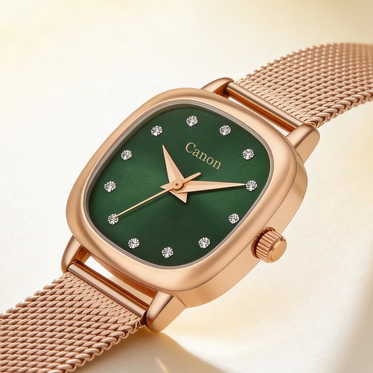 Elegant rose gold watch with green dial, crystal markers, and mesh band — timeless analog style for women.