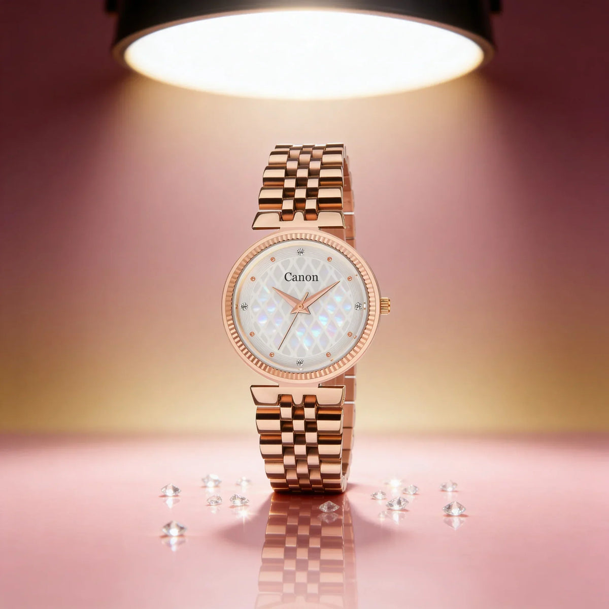 Elegant rose gold analog watch with diamond accents and mother-of-pearl dial under soft spotlight
