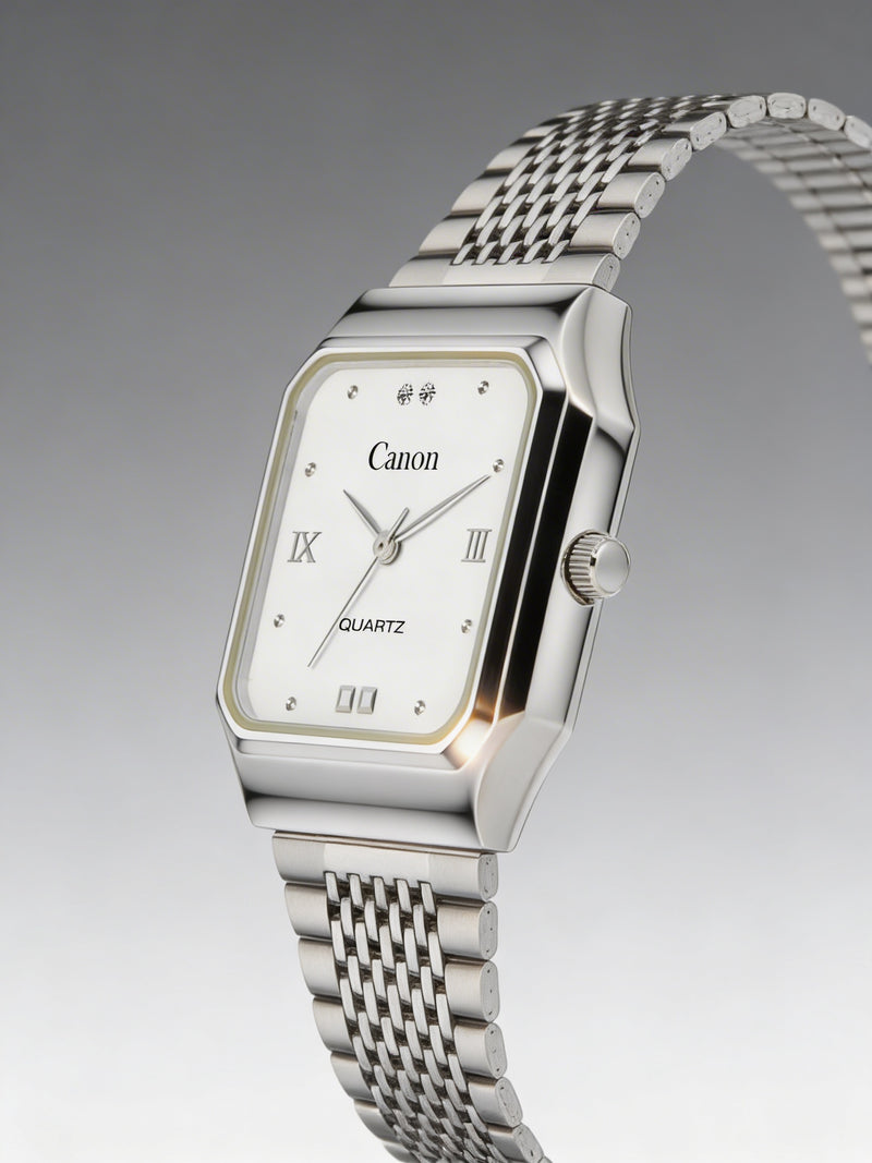 Elegant analog quartz watch with silver metal band and rectangular white dial