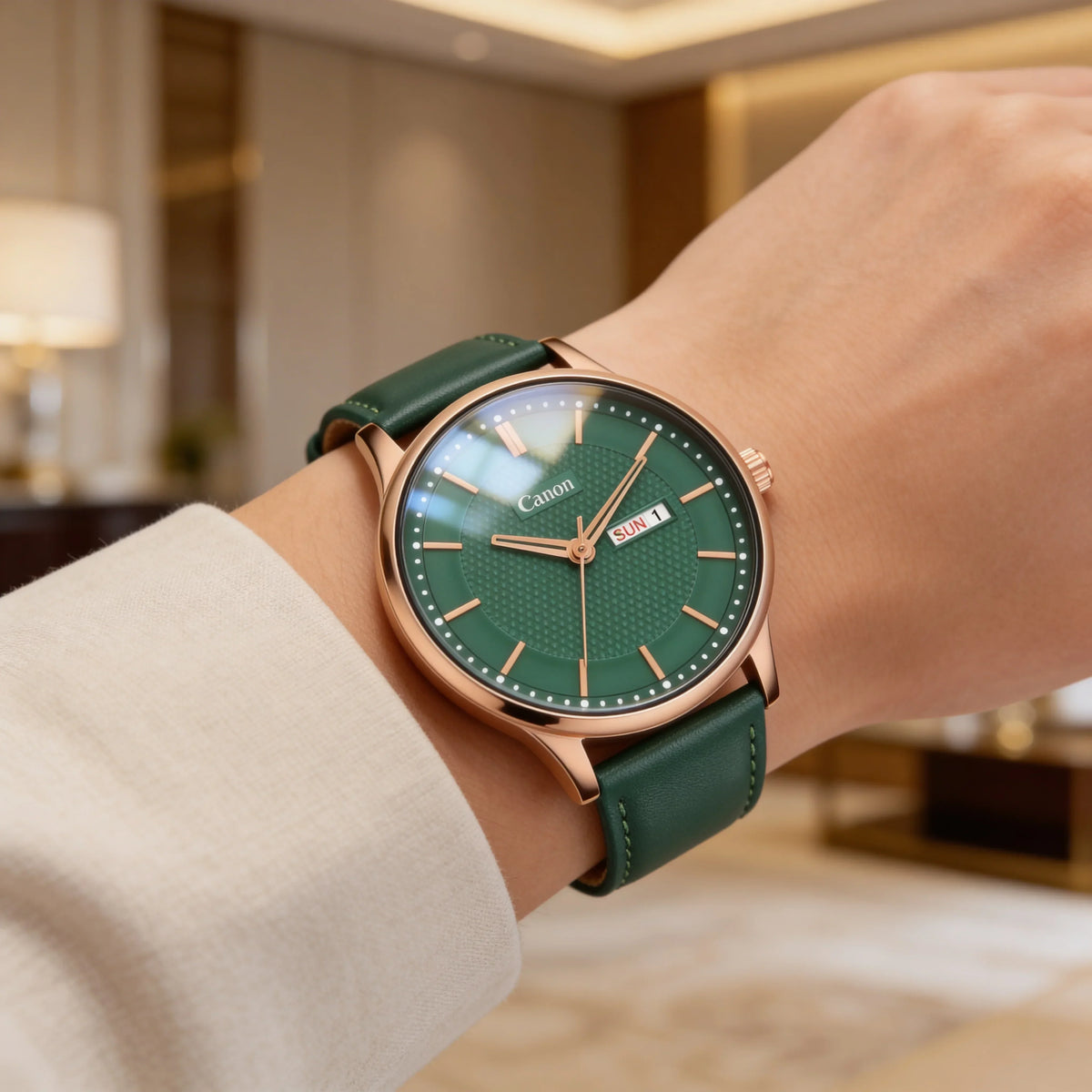 Elegant green analog wristwatch with day-date display and gold case on a person's wrist