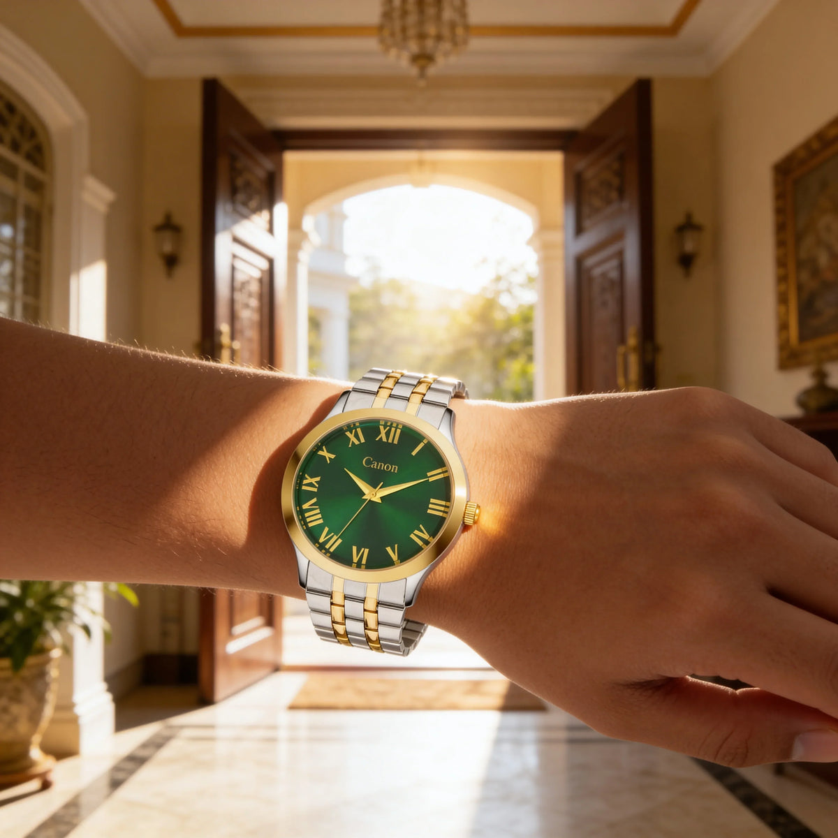 Luxury analog wristwatch with green dial and gold Roman numerals worn indoors in sunlight