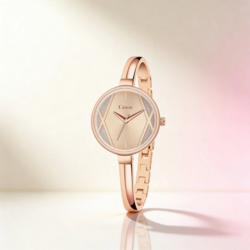 Rose gold analog women's watch with minimalist dial and slim bracelet on a soft background.