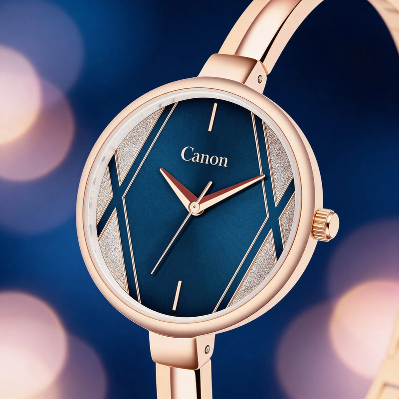Elegant analog wristwatch with blue and gold face, rose gold band, and geometric accents