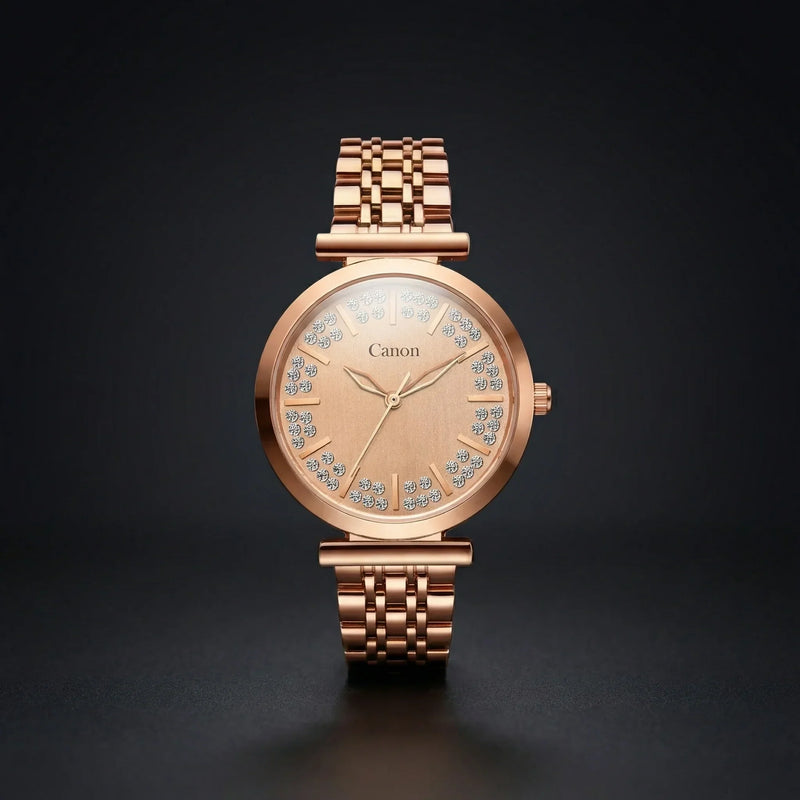 Rose gold analog watch with metal link band and crystal-accented dial on black background