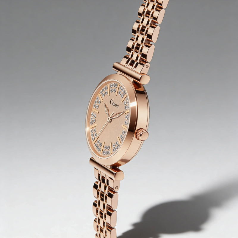 Rose gold analog women's watch with crystal-accented dial and metal link bracelet