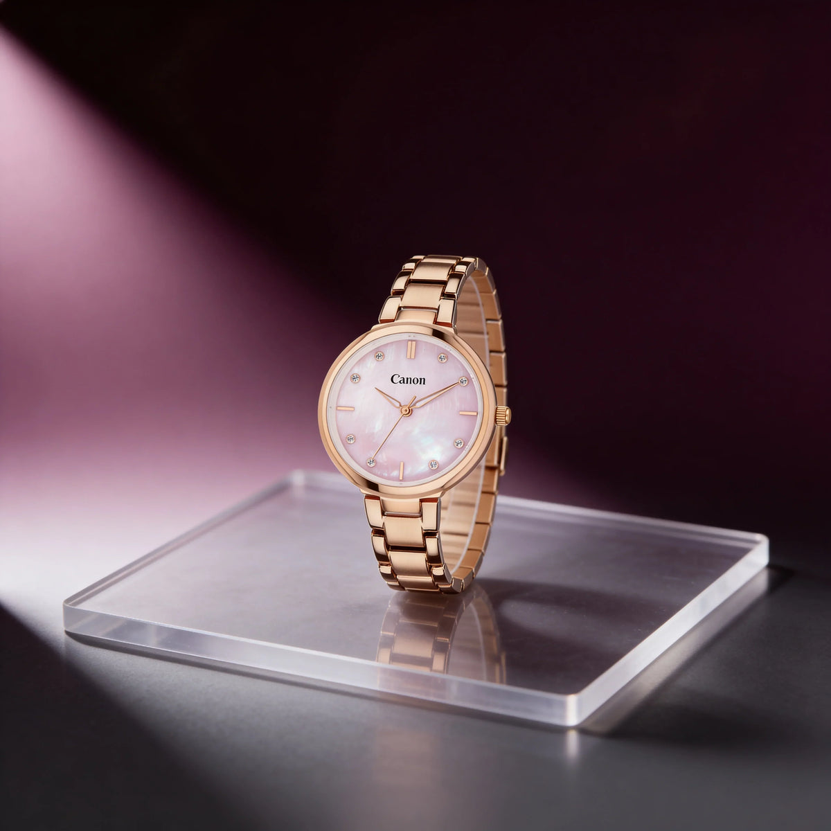 Elegant rose gold watch with pearl dial and diamond markers on clear stand