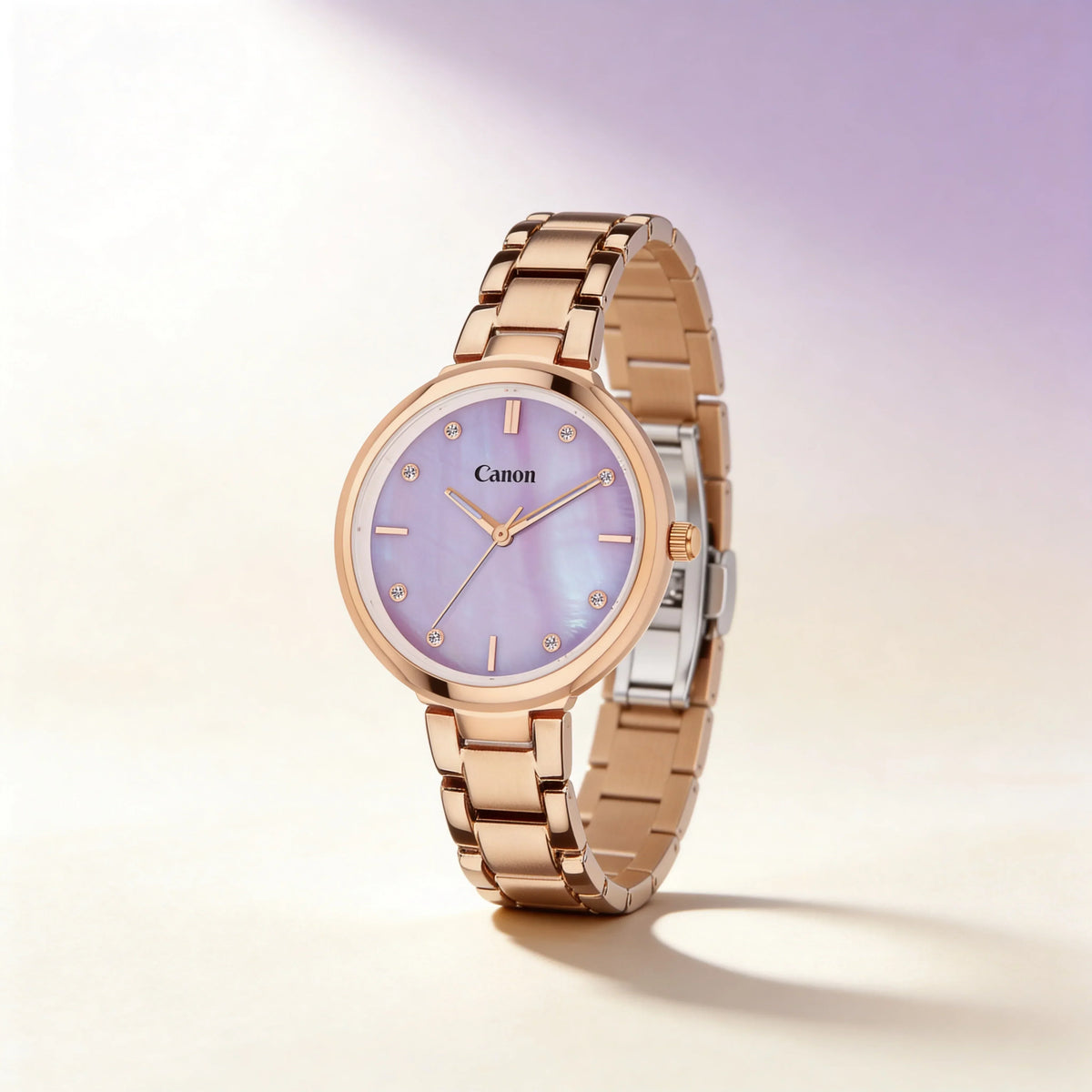 Elegant rose gold women's watch with purple mother-of-pearl dial and crystal hour markers