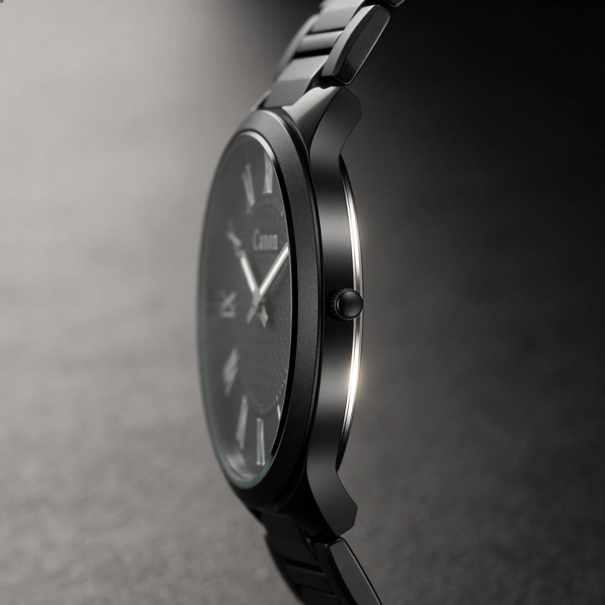 Canon analog watch with black metal band and sleek design, showcasing timeless style and craftsmanship