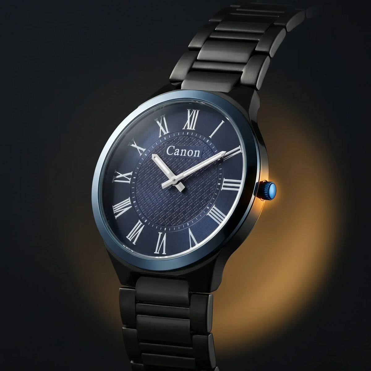 Canon analog watch with black metal band, blue dial, Roman numerals, and textured face on dark background