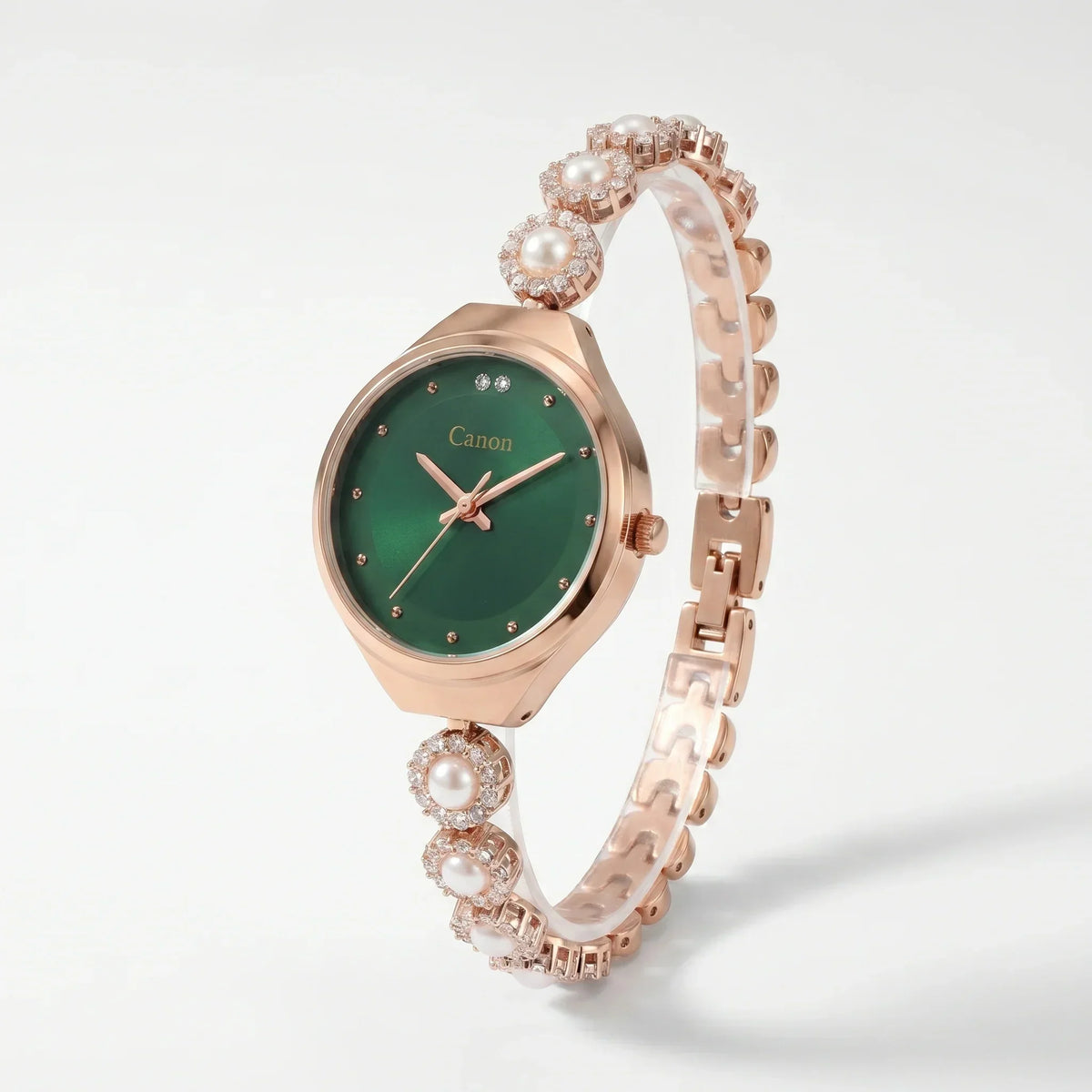 Elegant rose gold watch with green dial, pearl accents, and crystal embellishments for women