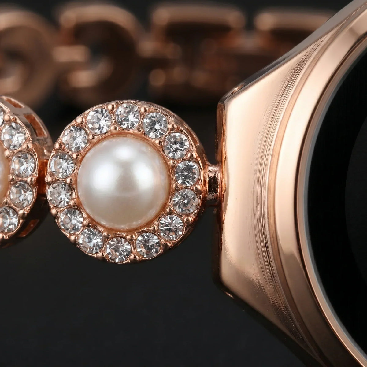 Rose gold watch with pearl and crystal accents, elegant analog design for women