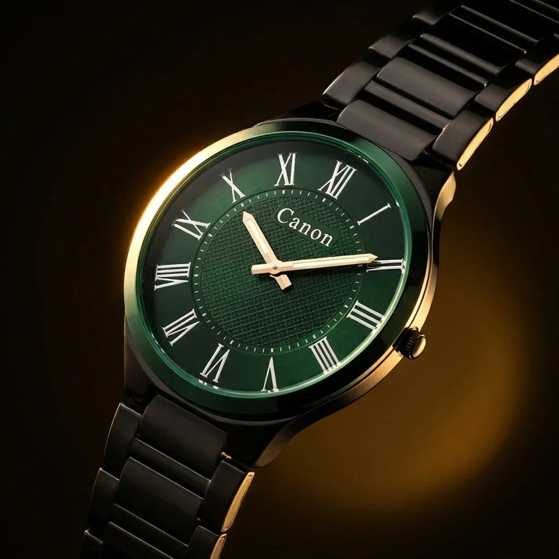 Elegant green dial analog watch with Roman numerals, gold accents, and black metal band. Timeless style for men or women.