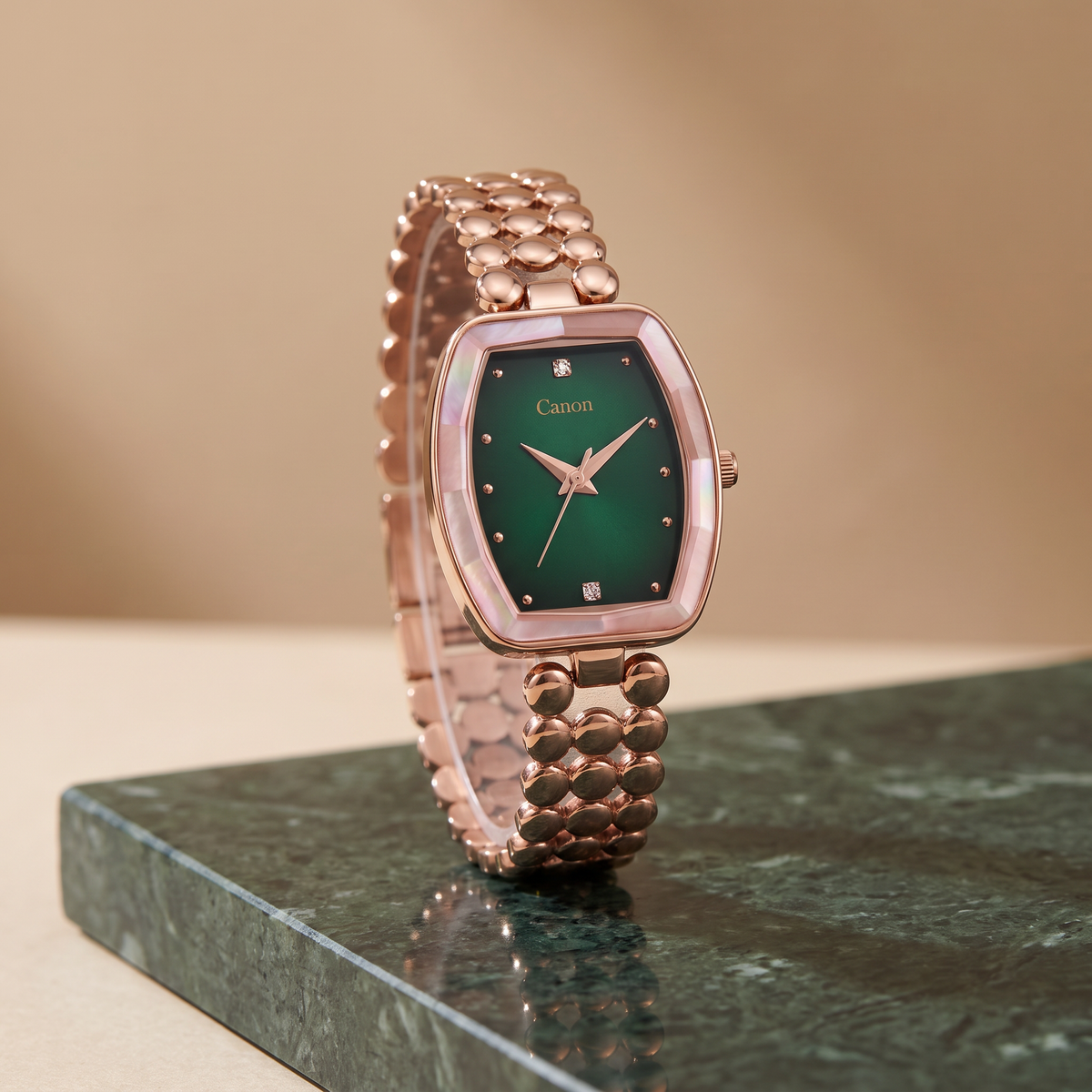 CN-525 emerald green rose gold watch standing on dark green marble