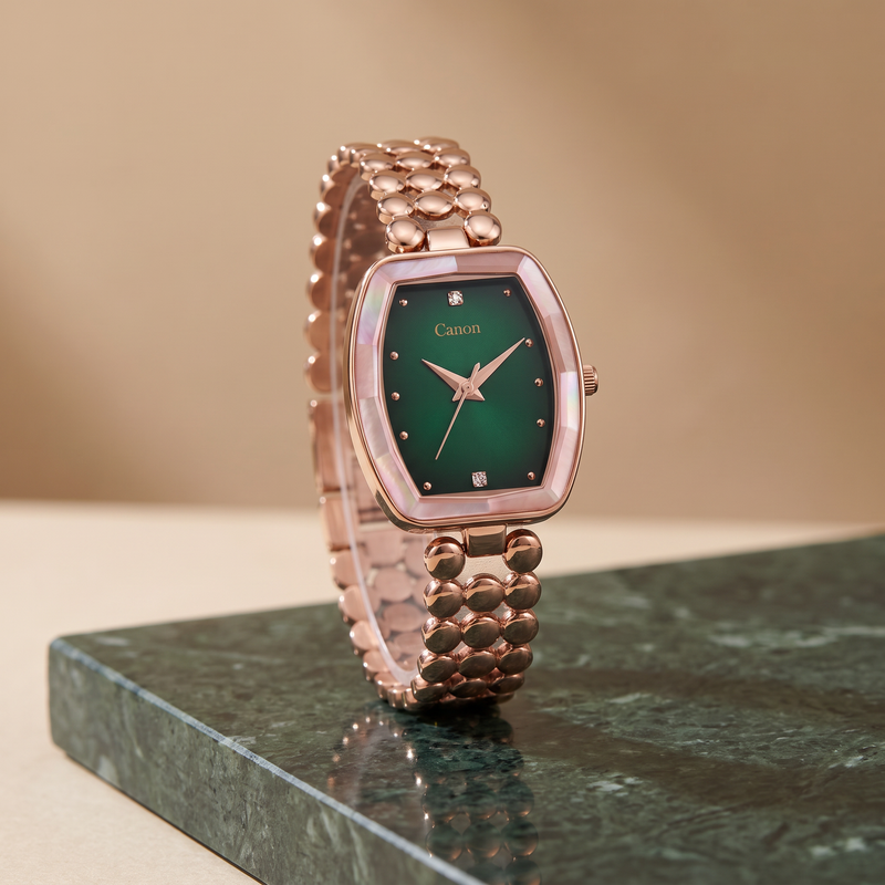 CN-525 emerald green rose gold watch standing on dark green marble