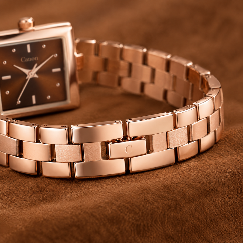 Macro of CN-538 rose gold link bracelet and clasp on suede