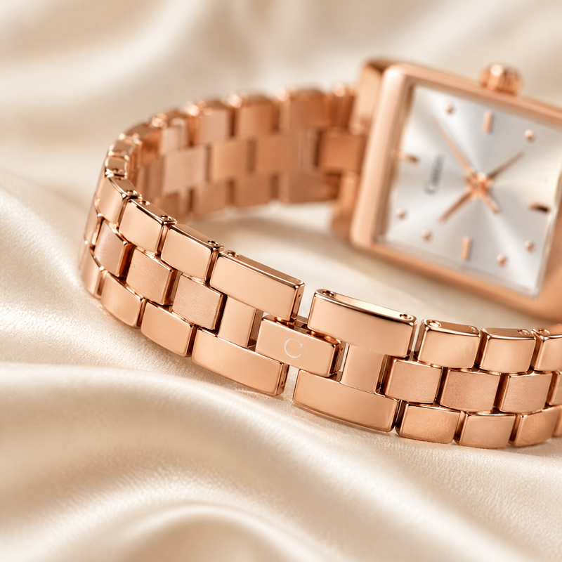 Macro of CN-539 rose gold link bracelet and clasp on ivory silk