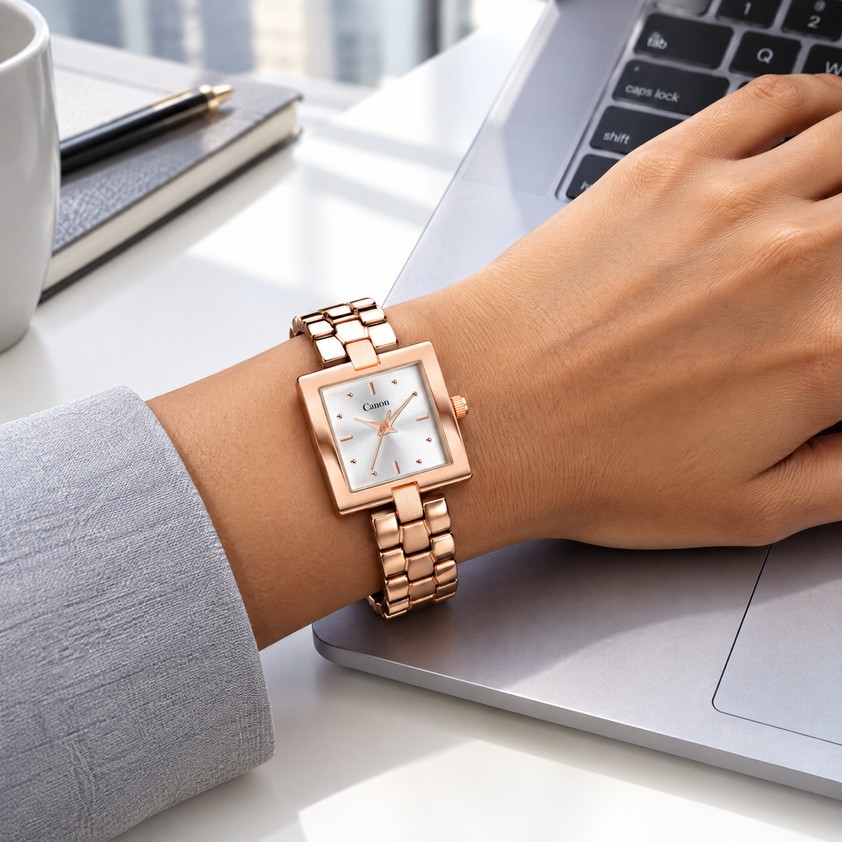 Woman wearing CN-539 while working on a laptop